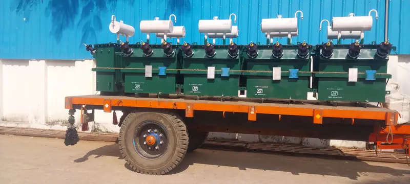 Batch of Dynamech distribution transformers on a trailer for dispatch to an MP DISCOM