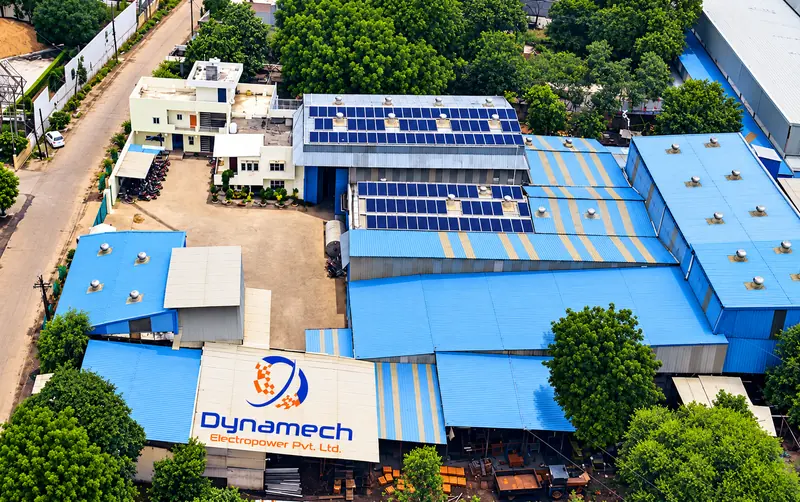 Aerial view of the Dynamech Electropower transformer factory in Govindpura Industrial Area, Bhopal, with rooftop solar