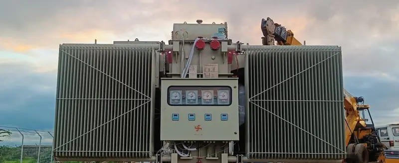 5.4 MVA Dynamech power transformer with radiators and marshalling box at site