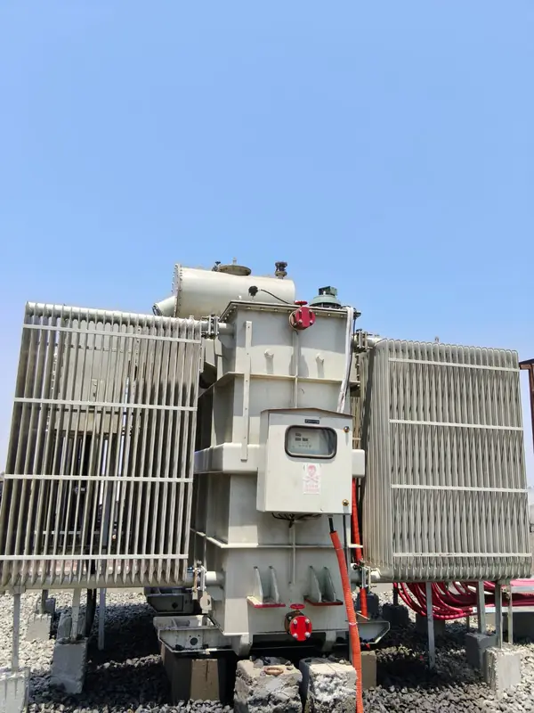 Transformer installed on a plinth at a utility site